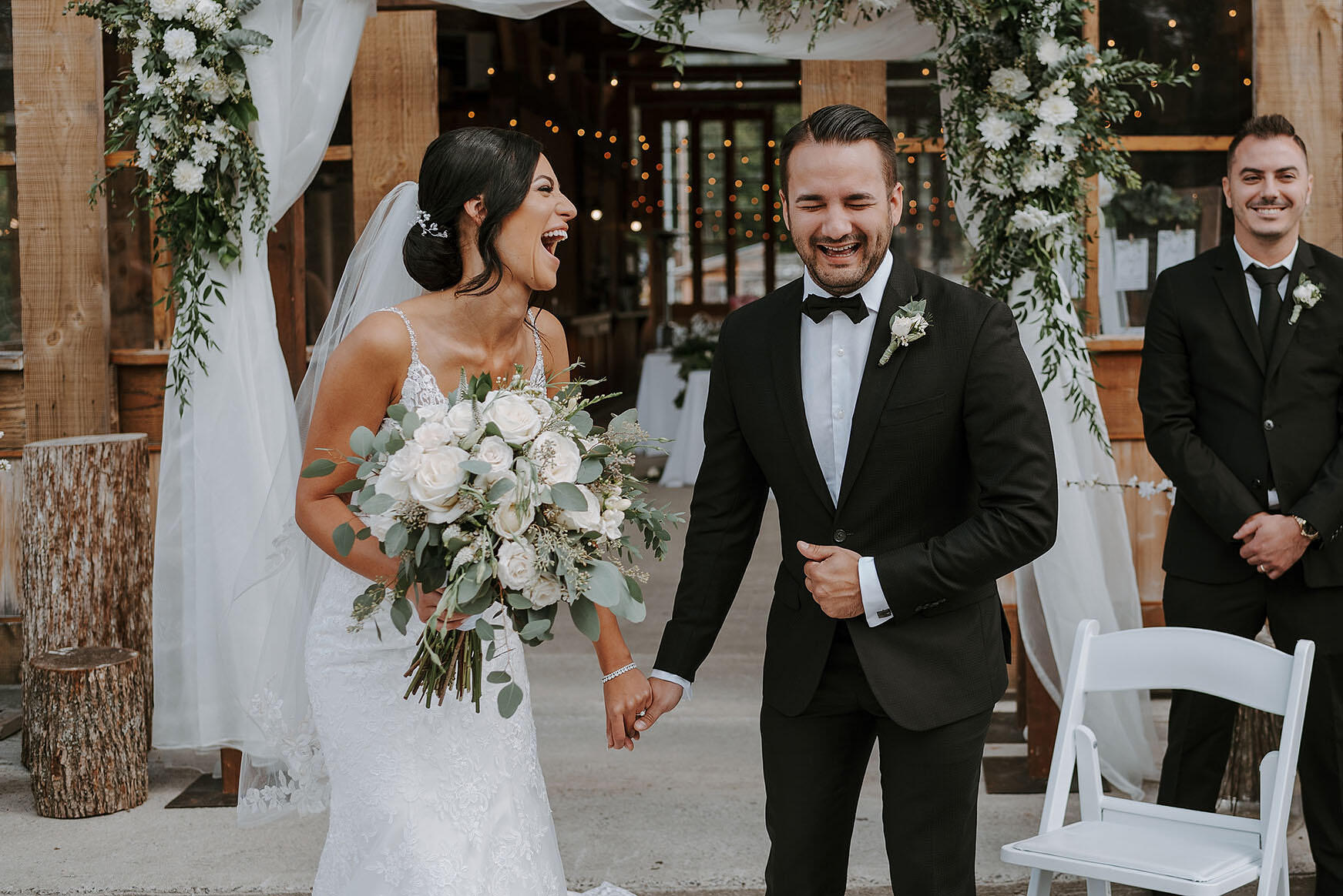 Bride and Groom laughing during the ceremony. Bride and Groom laughing during the ceremony.